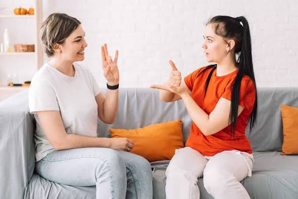Two girls learning language