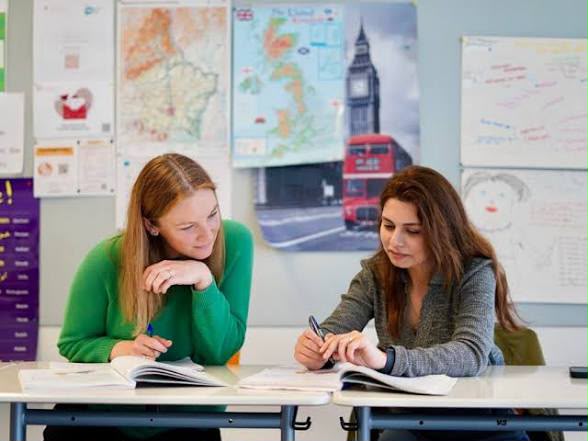 two girls learning